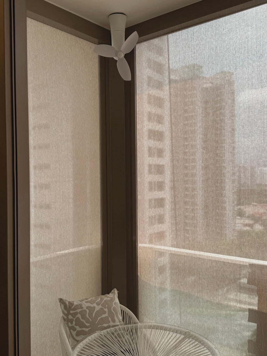 Spin quincy white ceiling mount corner fan installed in corner of balcony